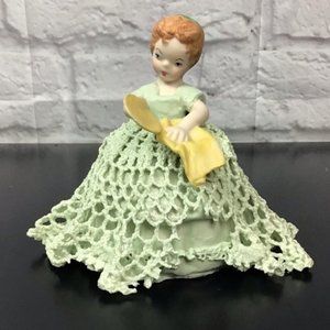 Vintage girl cleaning dishes Lace figurine